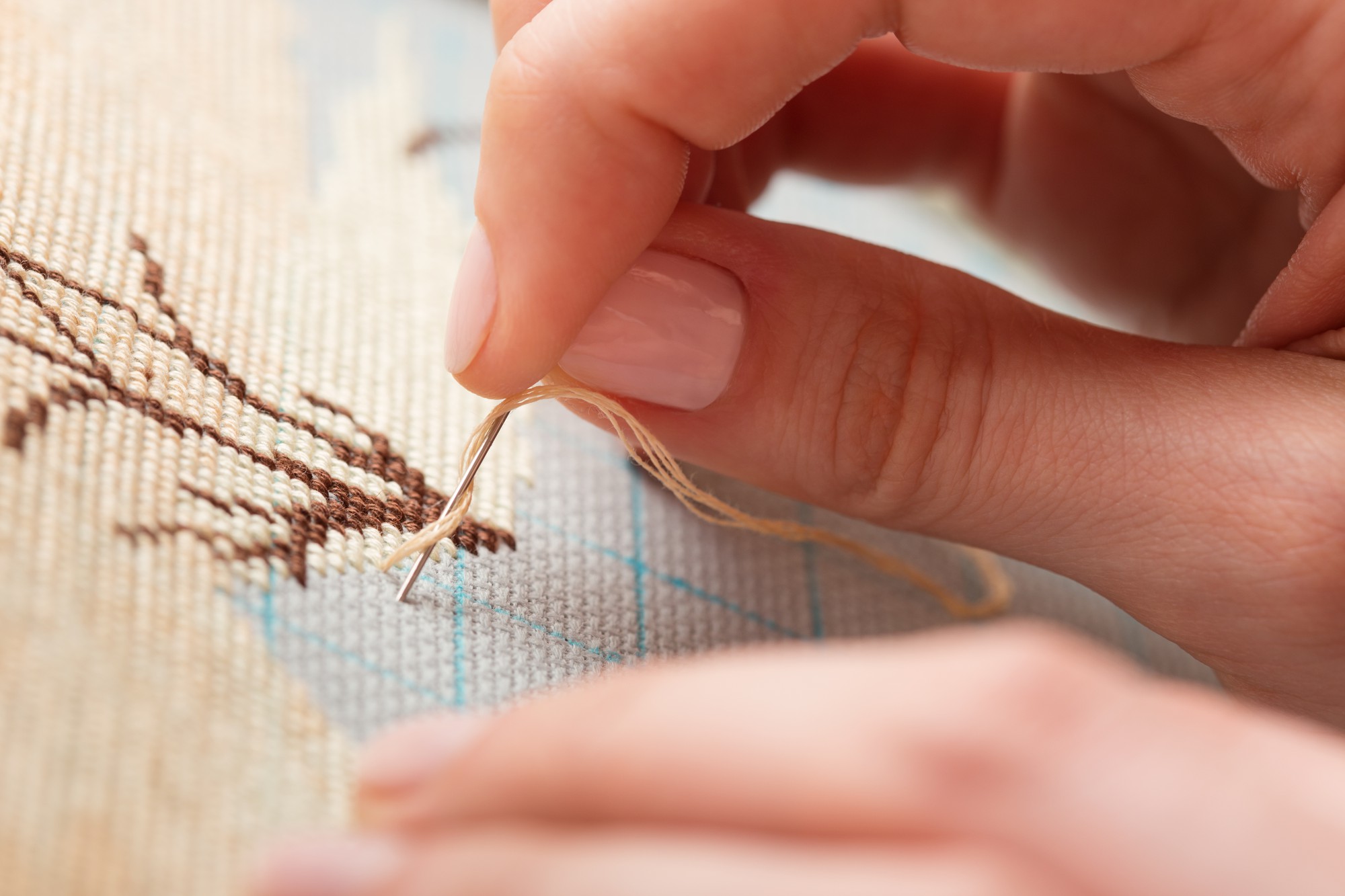 Close-up of hand embroidery on linen